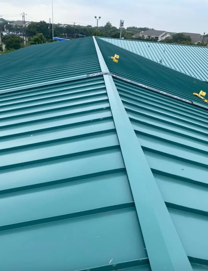 Green commercial metal roof ridge and valley for Metal Roof Repair in Crozet